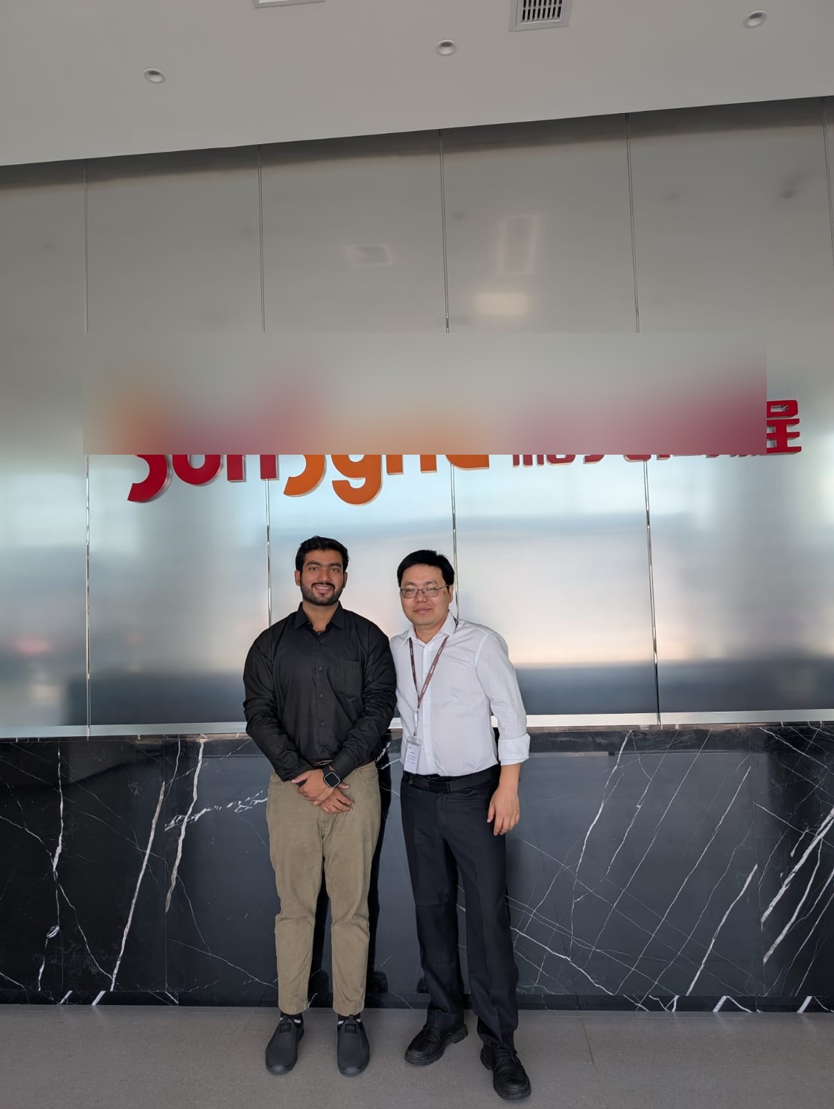 Charginity team member with a technology partner during the China visit