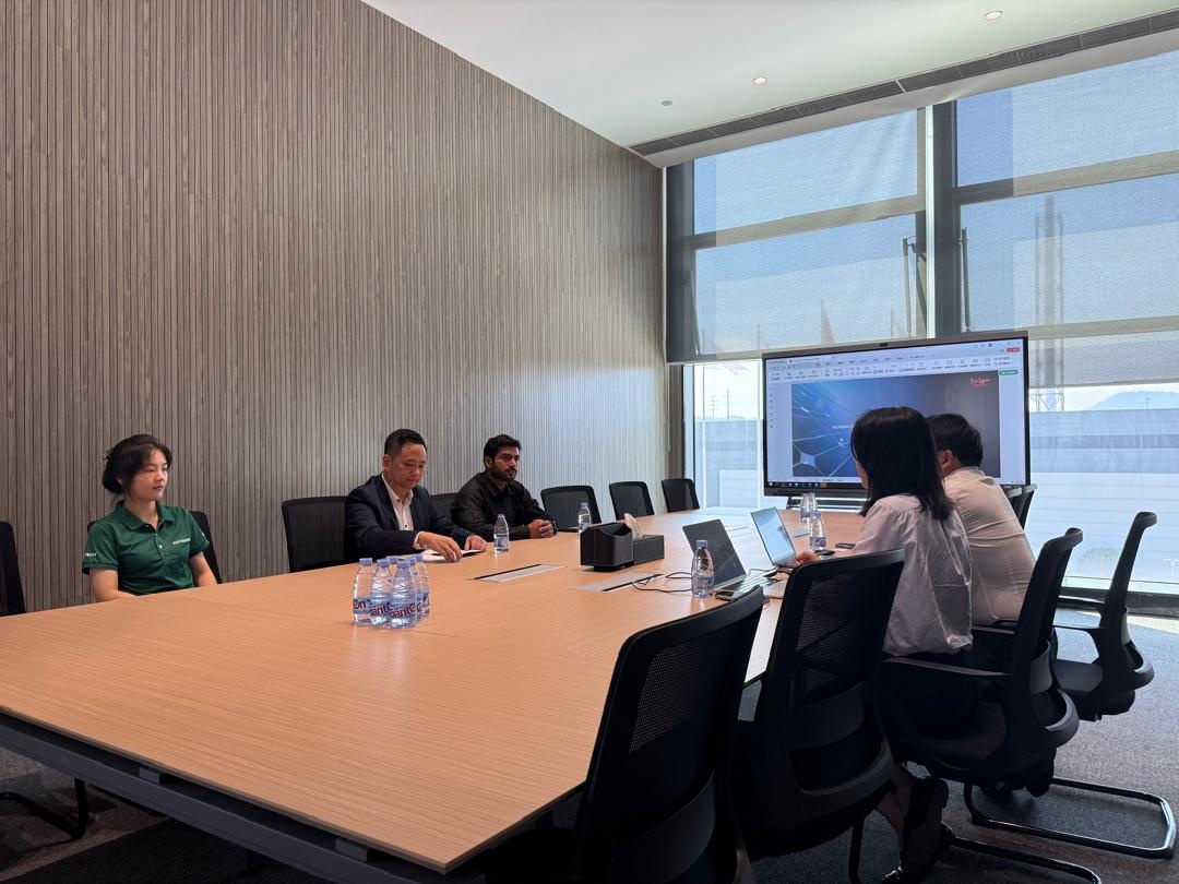 Supplier technical review session with presentation screen